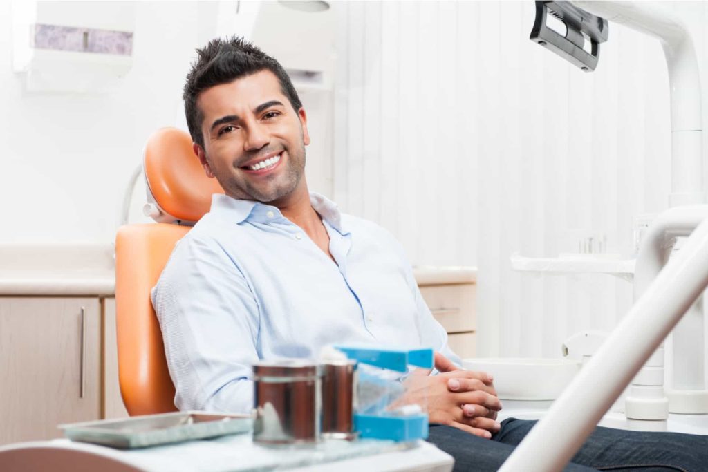 happy male dental patient